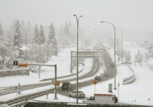Traffic light at an intersection in winter.